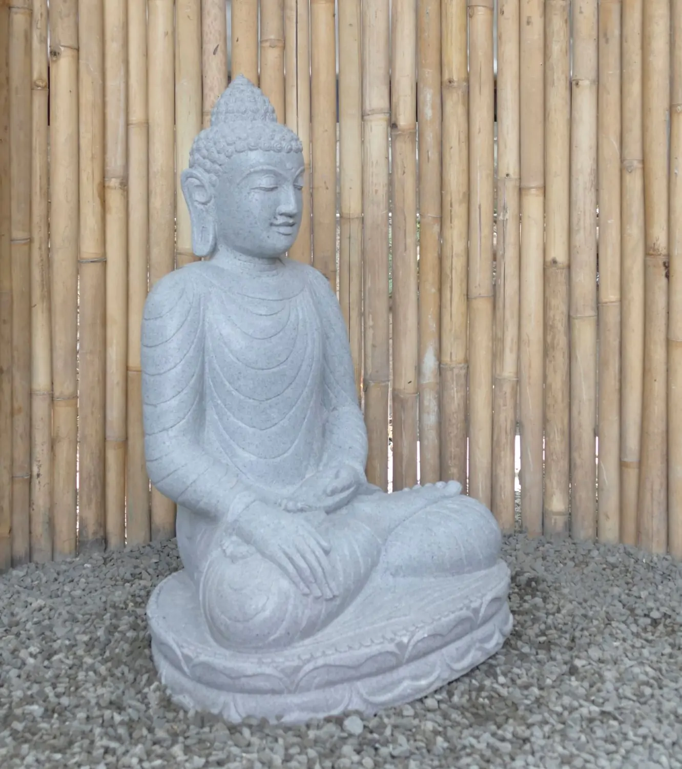  Product image 2 of the product “Seated Buddha made of Riverstone in Bhumisparsha - gesture of touching the earth. 83cm height. ”